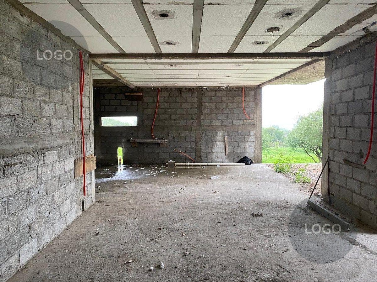 Land with a building for sale