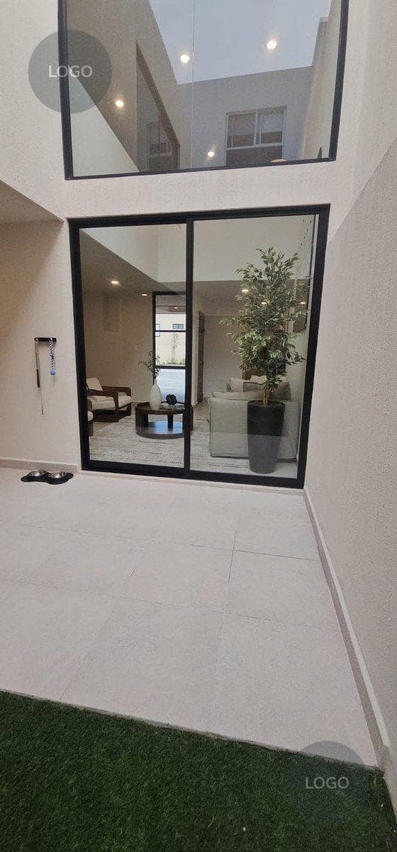 Zaru Double-Height House
