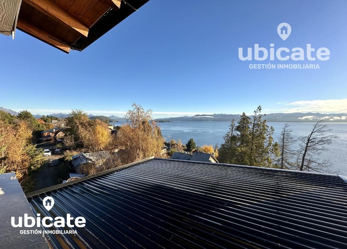 3-bedroom lakefront apartment with a balcony, terrace, and grill