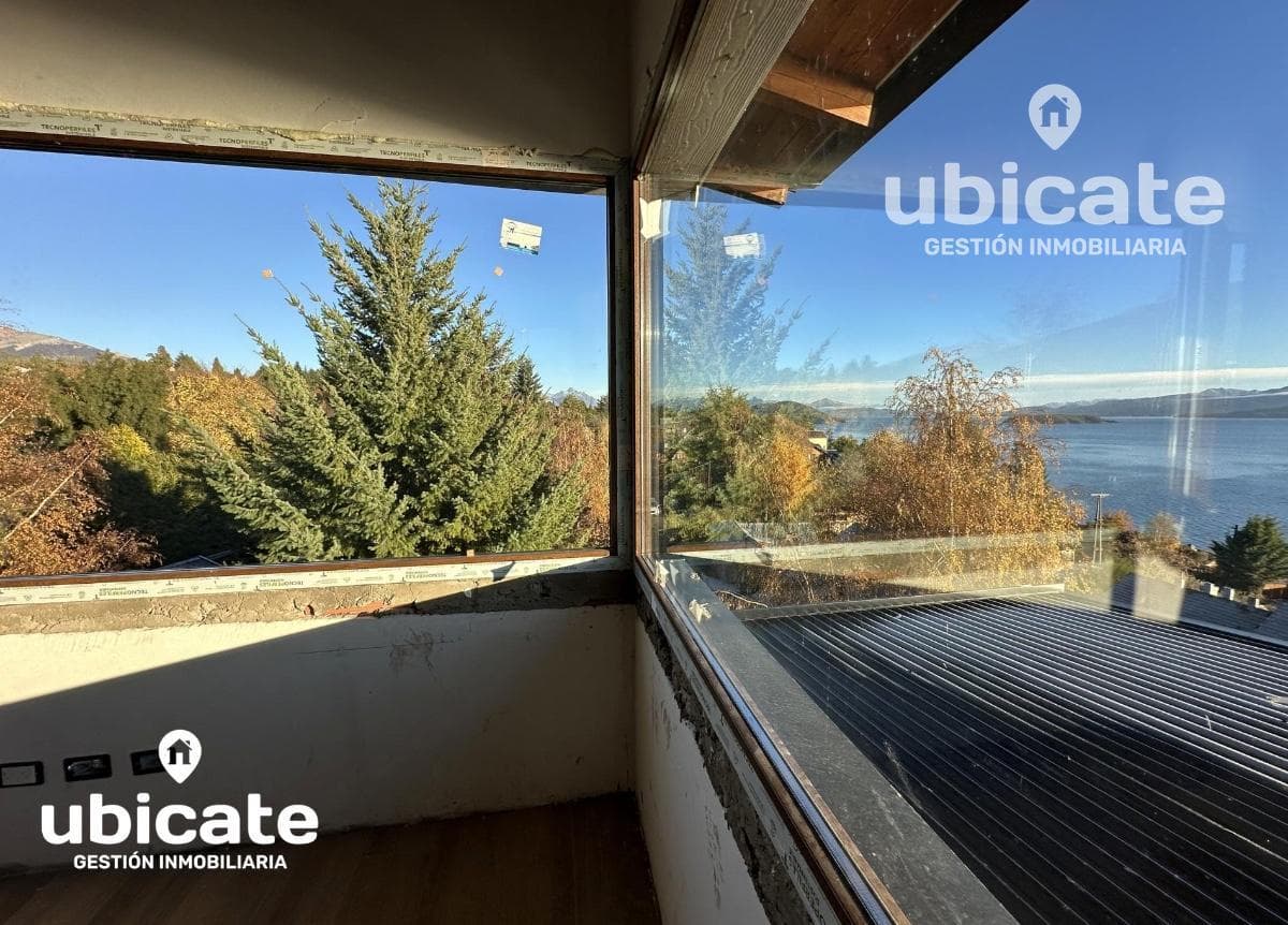 3-bedroom lakefront apartment with a balcony, terrace, and grill