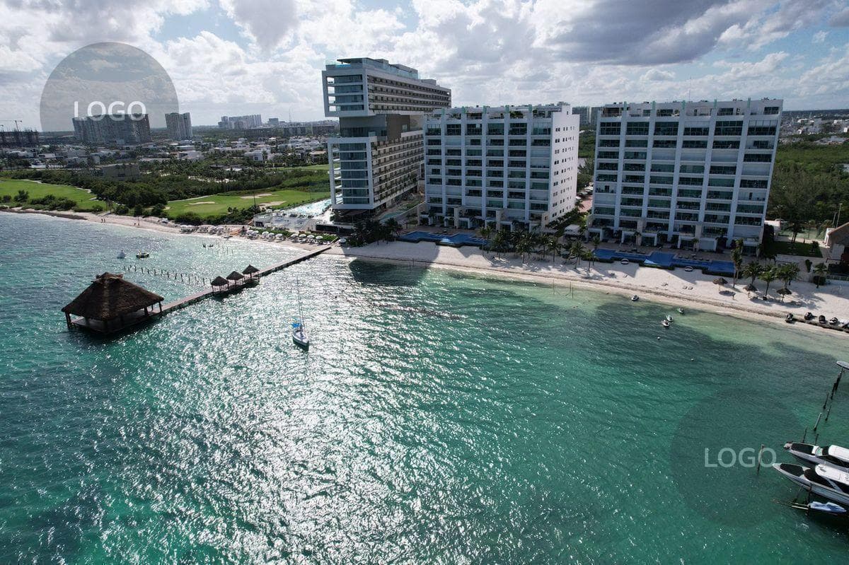 SPECTACULAR APARTMENT FOR SALE IN CANCUN, ON THE BEACHFRONT