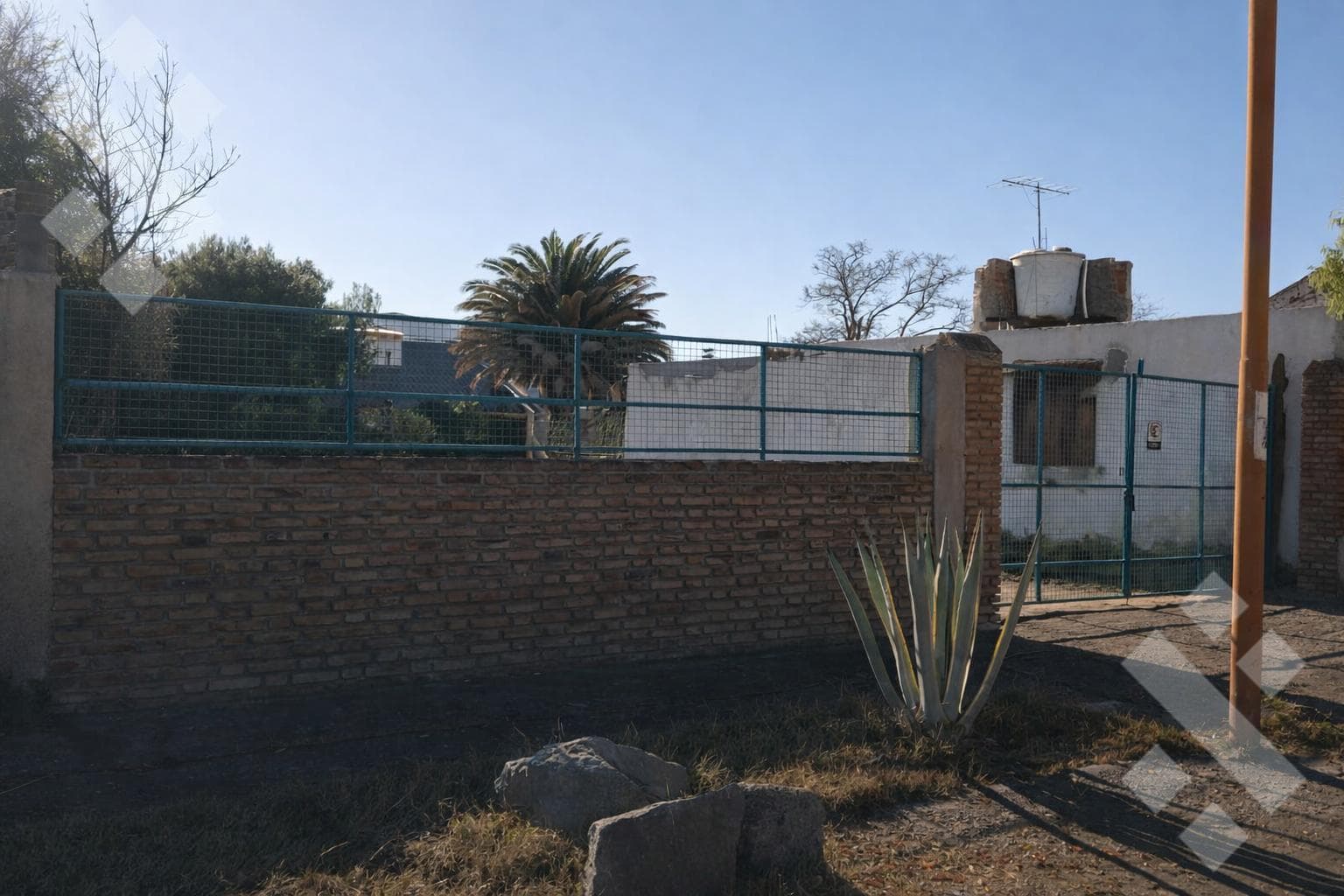 FOR SALE: 2-bedroom house and 1-bedroom apartment for flipping, with a large lot