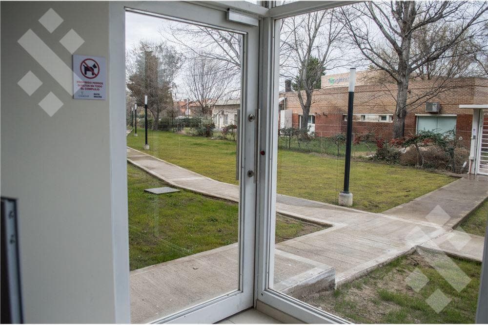 For Sale: Ground-Floor Apartment with 2 Bedrooms, Garage, and Storage Room - Clubhouse - Neuquén City