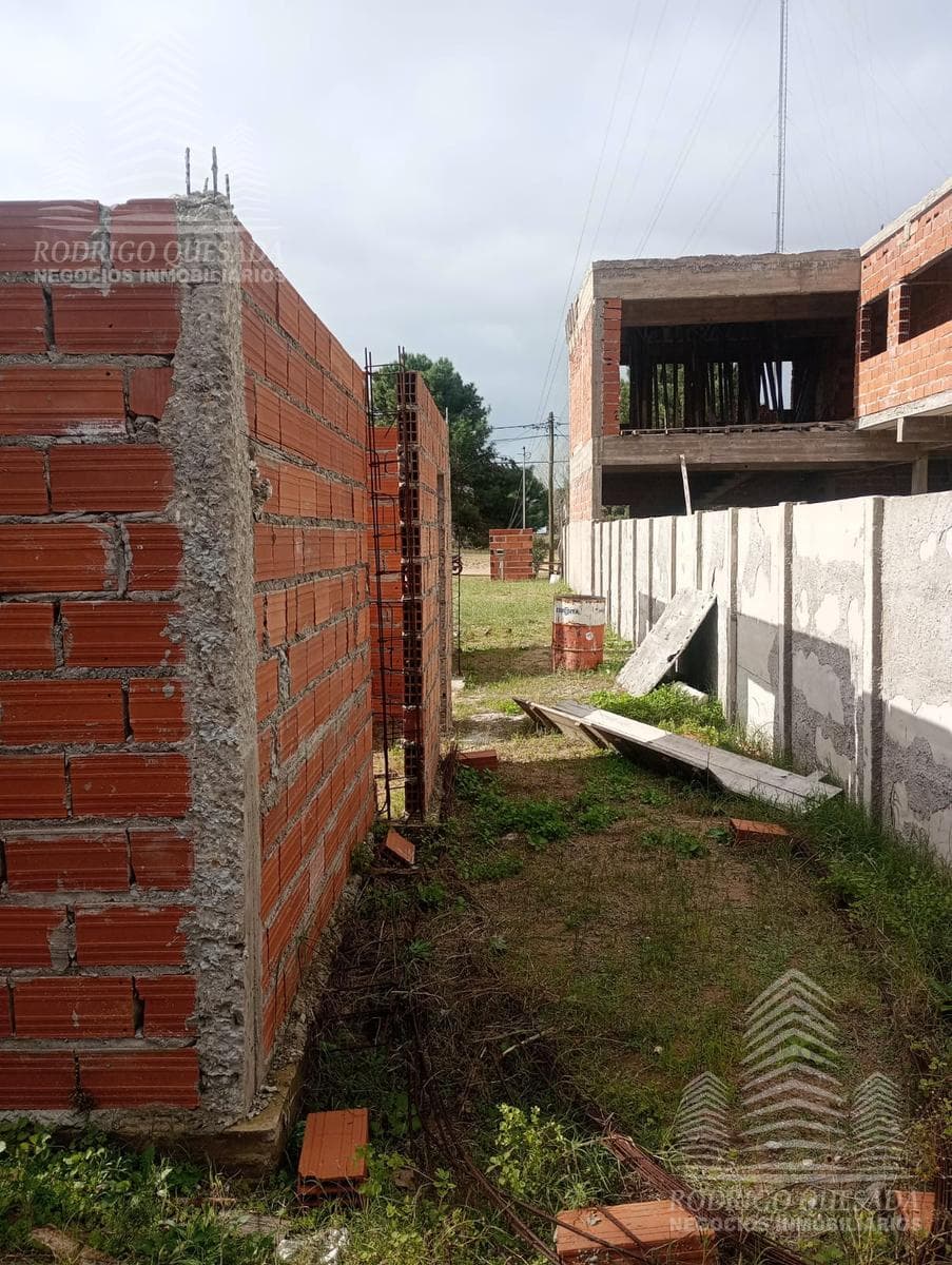 15x38 lot with improvements and construction in progress—2 single-family homes