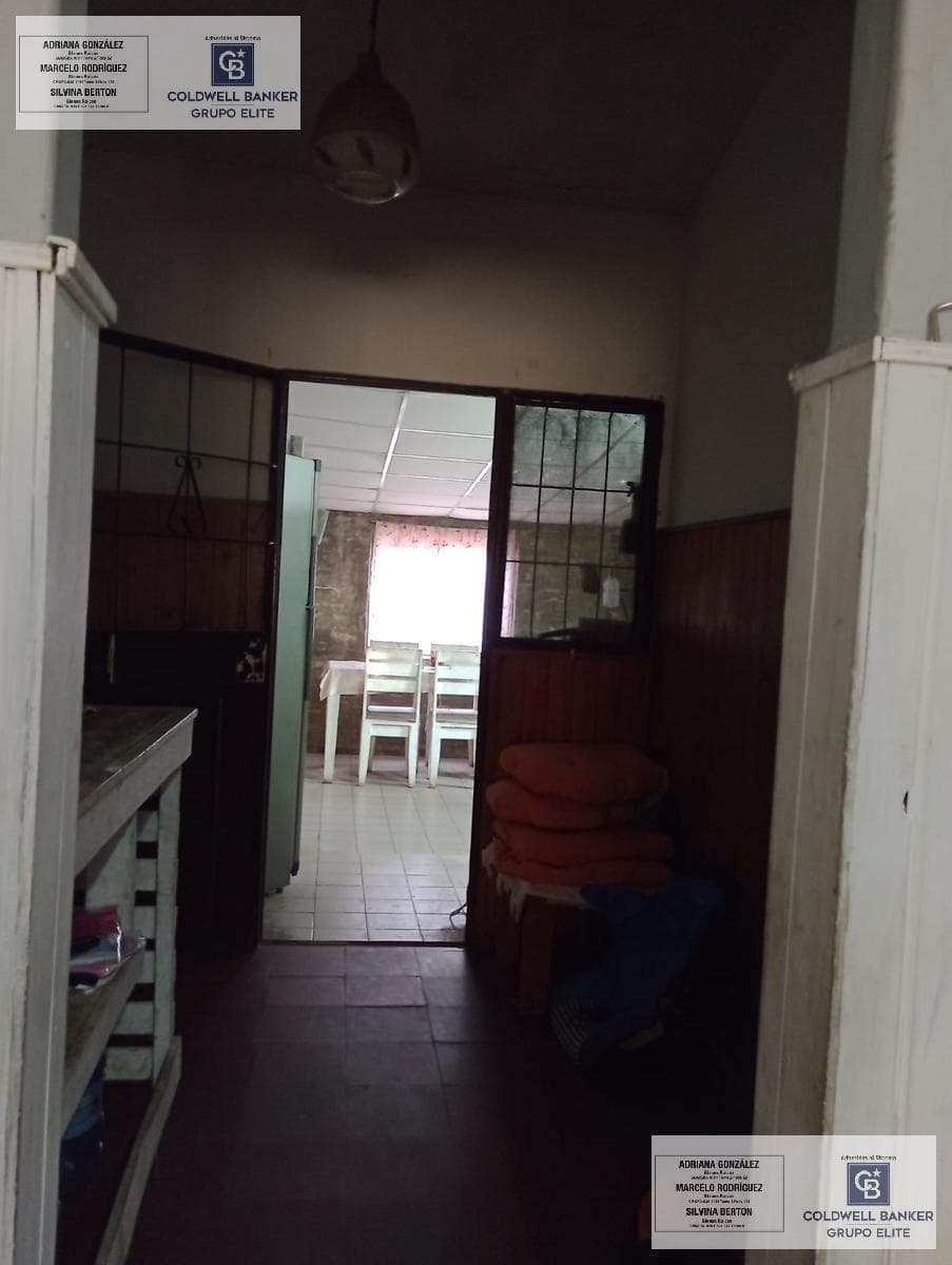 House with 3 bedrooms, a semi-covered garage, and a patio.