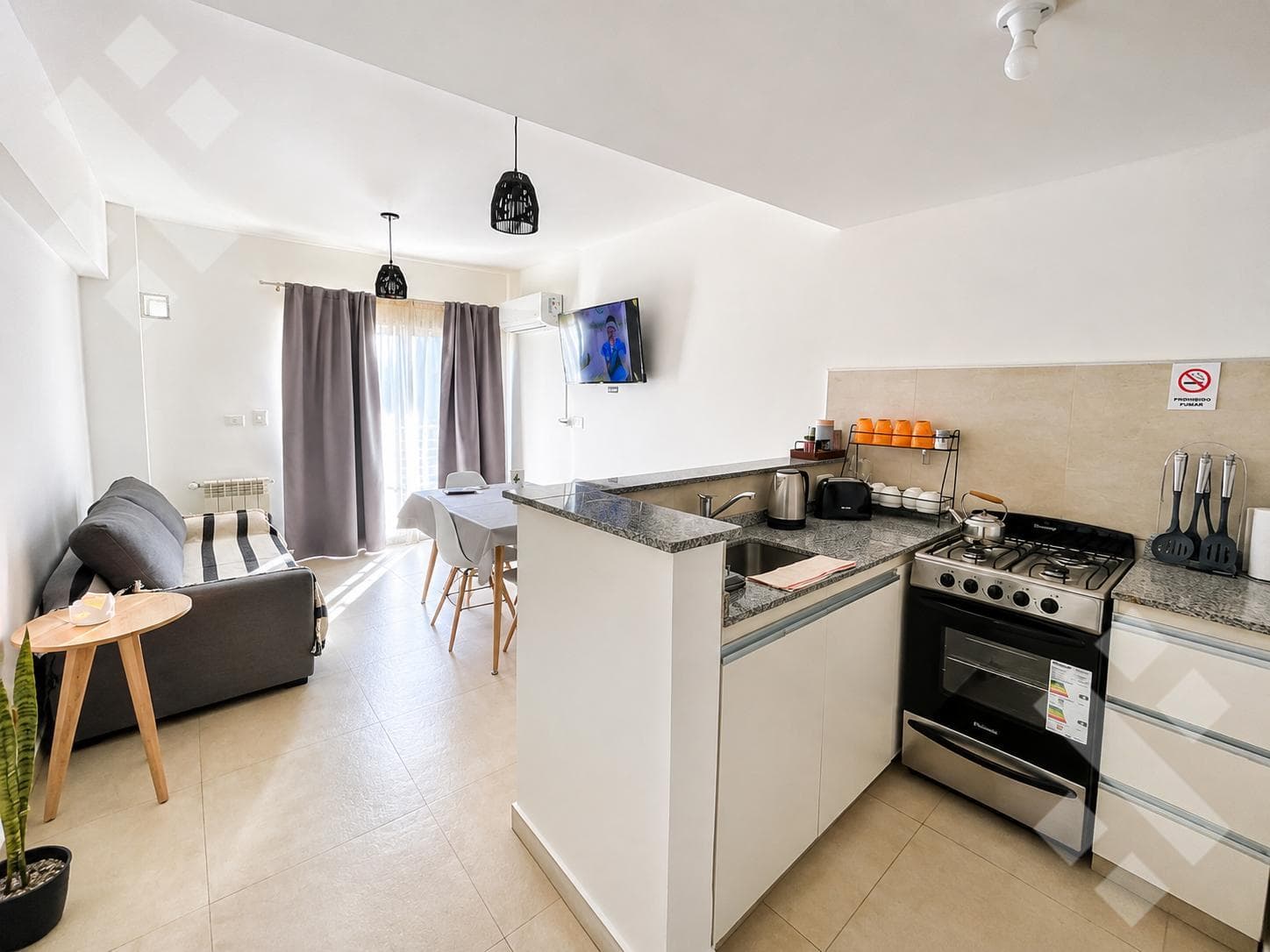 FURNISHED 1-BEDROOM APARTMENT FOR RENT WITH A BALCONY AND 2 TERRACES - DOWNTOWN - NEUQUÉN