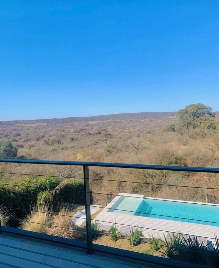 HOUSE FOR SALE: 3 BEDROOMS, TERRAZAS DE LA ESTANZUELA, LA CALERA, CORDOBA—QUALIFIES FOR A MORTGAGE!