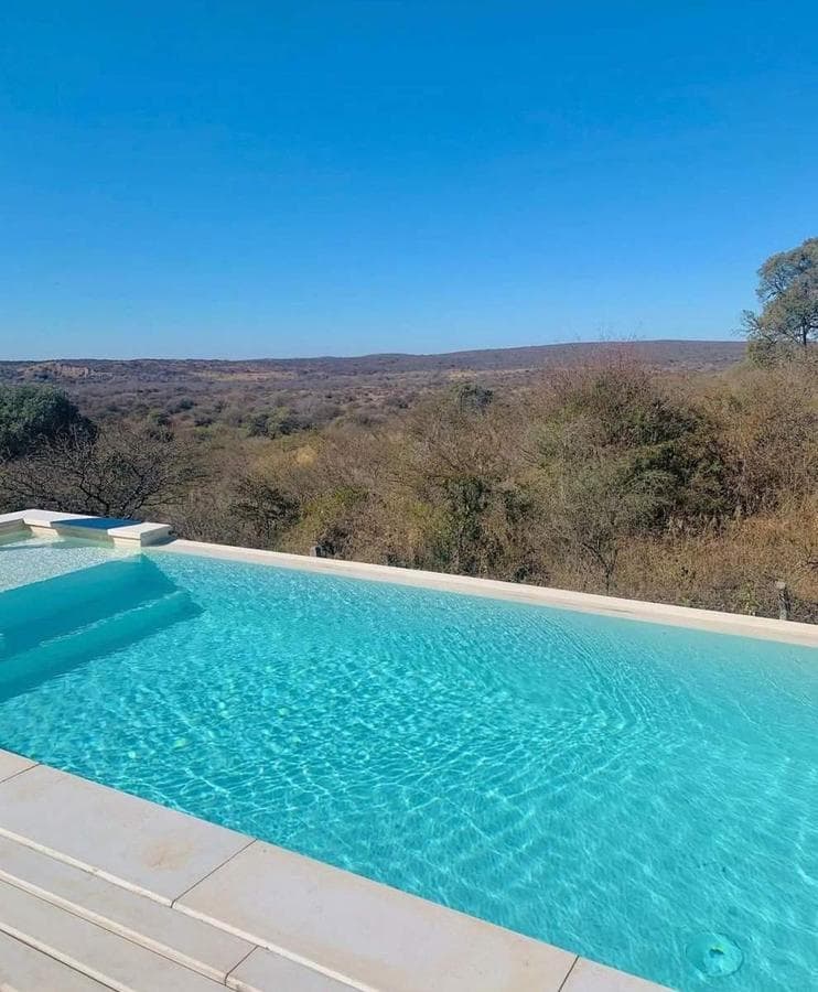 HOUSE FOR SALE: 3 BEDROOMS, TERRAZAS DE LA ESTANZUELA, LA CALERA, CORDOBA—QUALIFIES FOR A MORTGAGE!