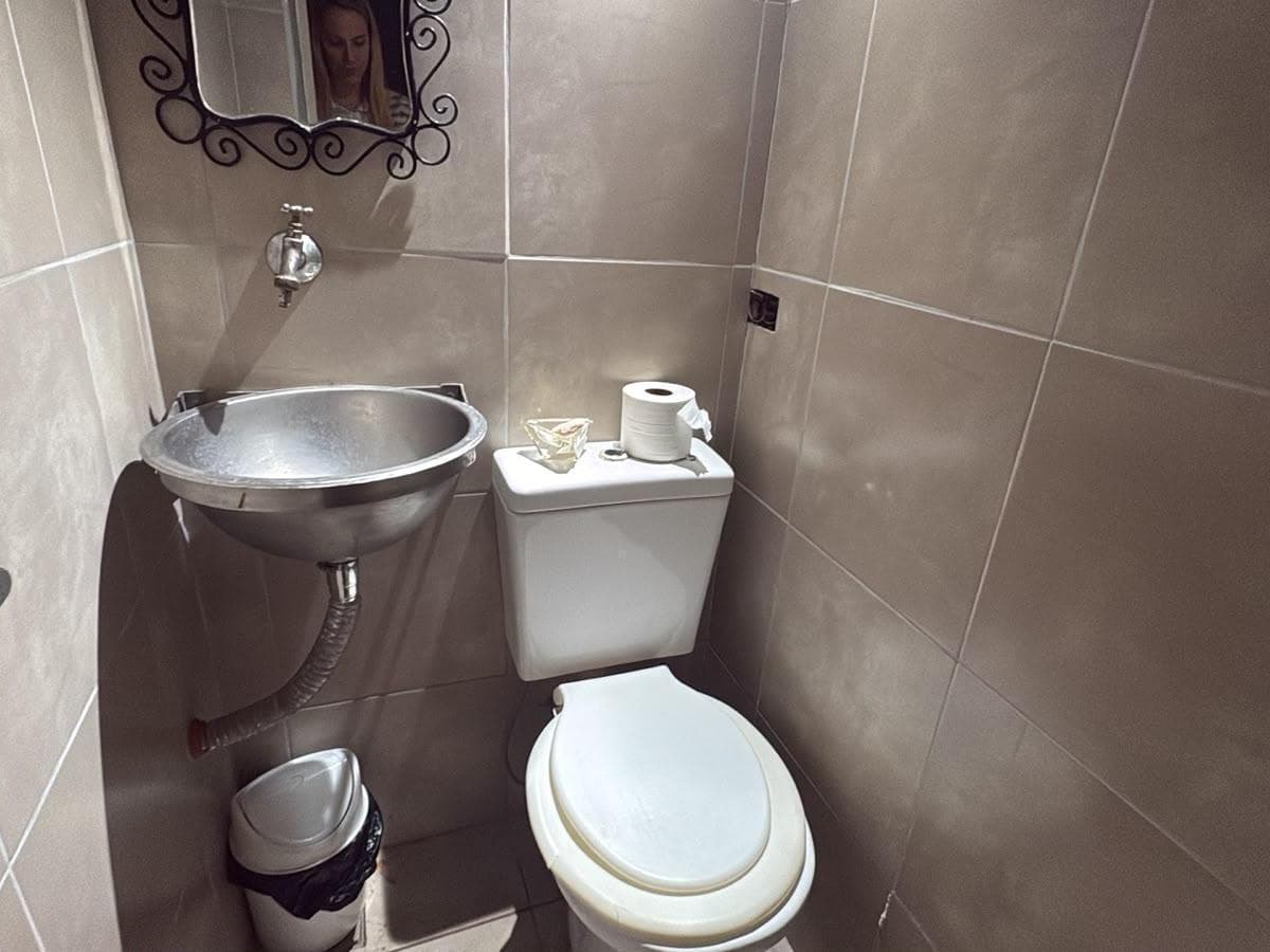 HOUSE, APARTMENT, OR COMMERCIAL SPACE FOR SALE ACROSS FROM THE CHURCH AND PLAZA IN VILLA ALLENDE, CORDOBA