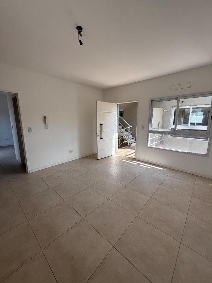 Brand-new half-floor apartment with balcony, garage, and barbecue area