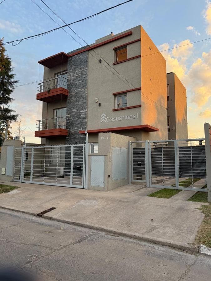 Brand-new half-floor apartment with balcony, garage, and barbecue area