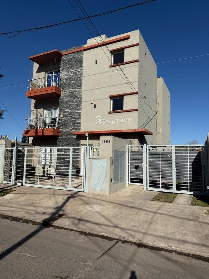 Brand-new half-floor apartment with balcony, garage, and barbecue area