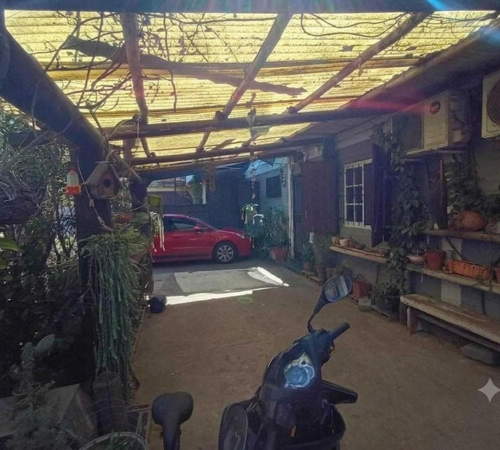 House with a patio, garage, and barbecue area