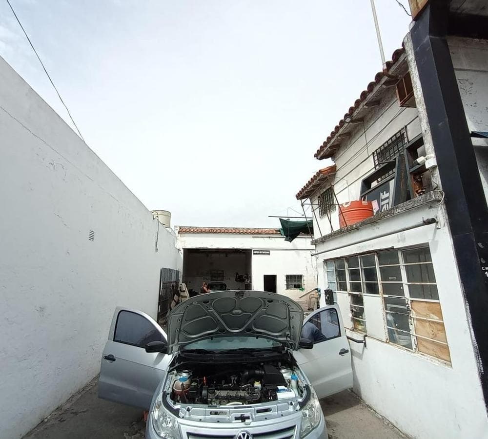 FOR SALE: COMMERCIAL CORNER PROPERTY—OPERATING LAUNDRY BUSINESS