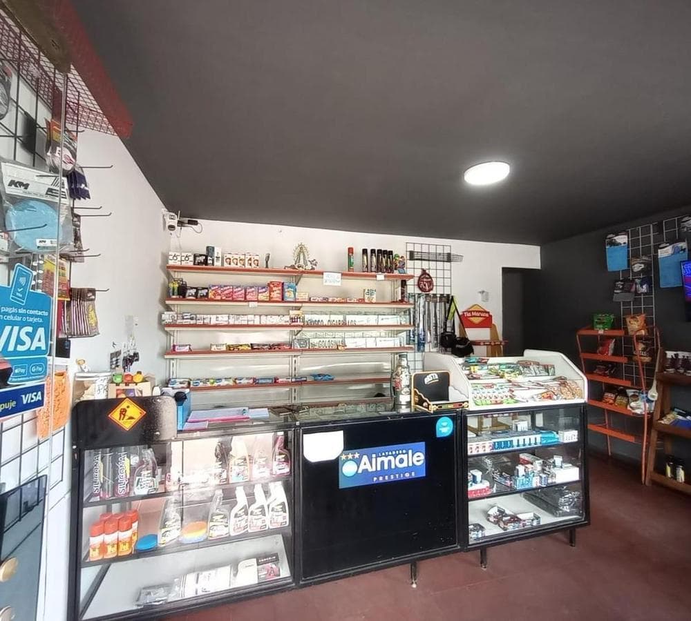 FOR SALE: COMMERCIAL CORNER PROPERTY—OPERATING LAUNDRY BUSINESS
