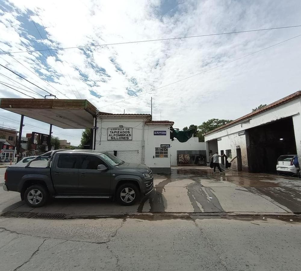 FOR SALE: COMMERCIAL CORNER PROPERTY—OPERATING LAUNDRY BUSINESS