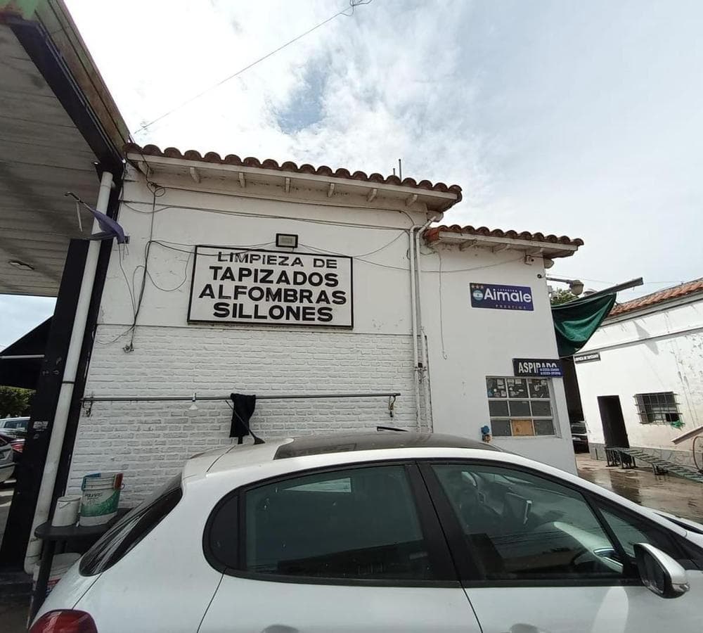 FOR SALE: COMMERCIAL CORNER PROPERTY—OPERATING LAUNDRY BUSINESS