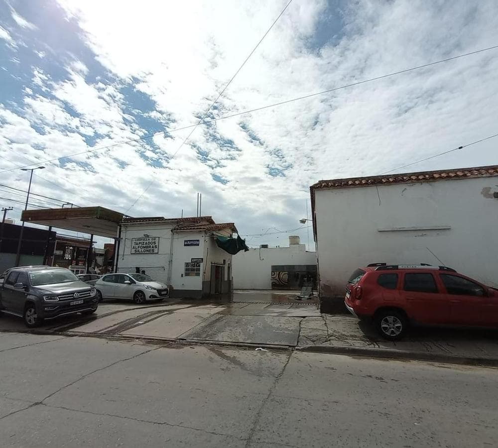 FOR SALE: COMMERCIAL CORNER PROPERTY—OPERATING LAUNDRY BUSINESS