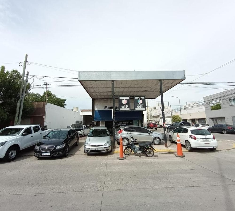 FOR SALE: COMMERCIAL CORNER PROPERTY—OPERATING LAUNDRY BUSINESS
