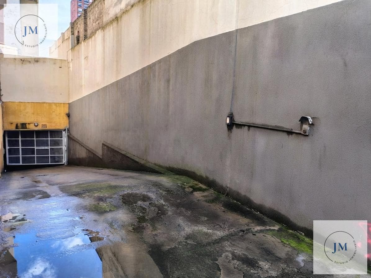 Covered Garage with Automatic Gate