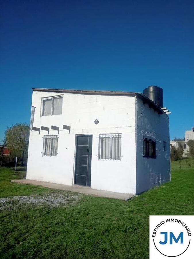 House on a large lot—needs finishing. Great opportunity. Trade accepted.