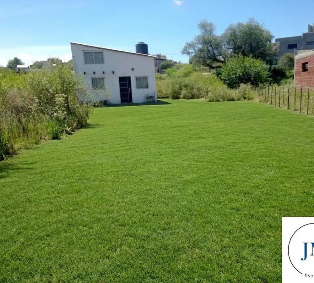 House on a large lot—needs finishing. Great opportunity. Trade accepted.