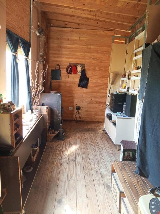 Cabin-style house, built using a wood-frame construction system.