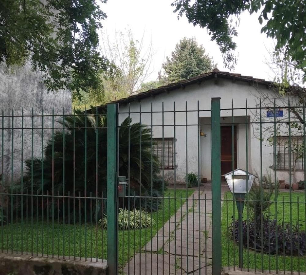 House in Need of Renovation with Large Lot
