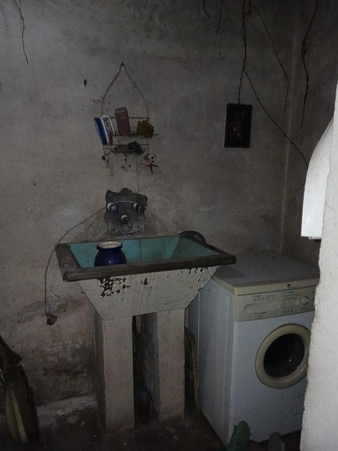 House in Need of Renovation with Large Lot
