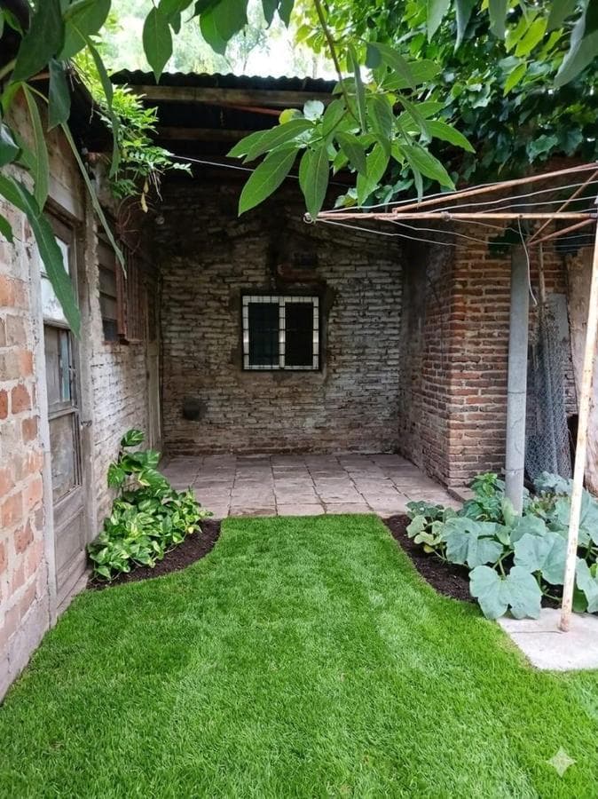 House in Need of Renovation with Large Lot