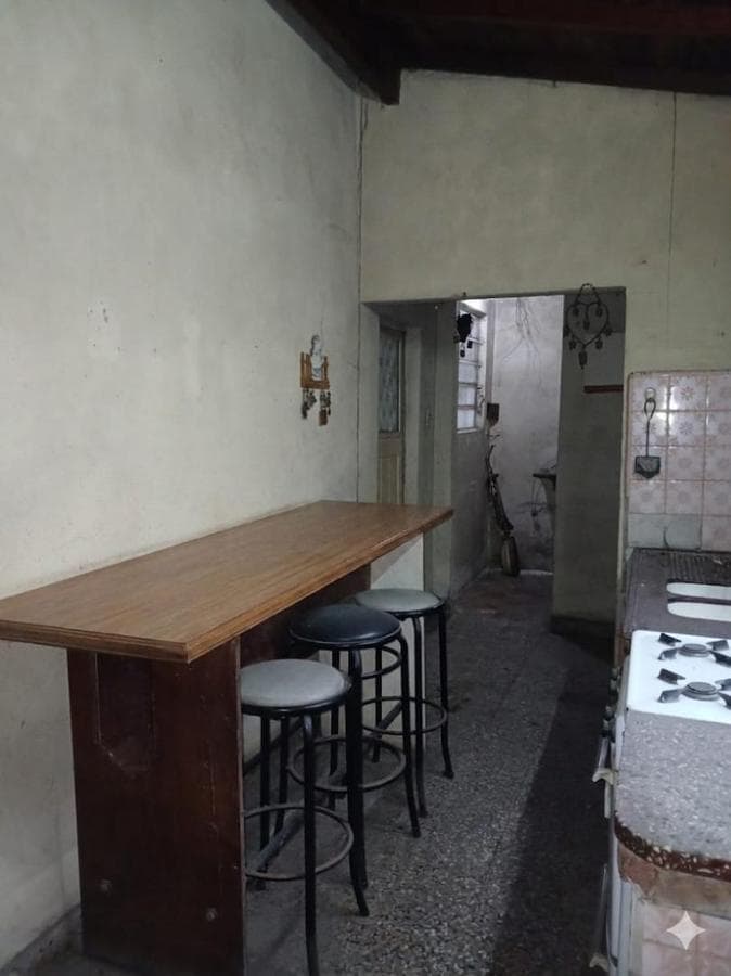House in Need of Renovation with Large Lot