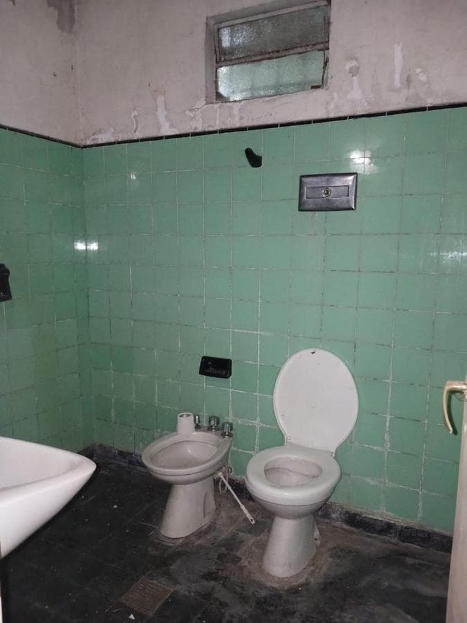 House in Need of Renovation with Large Lot