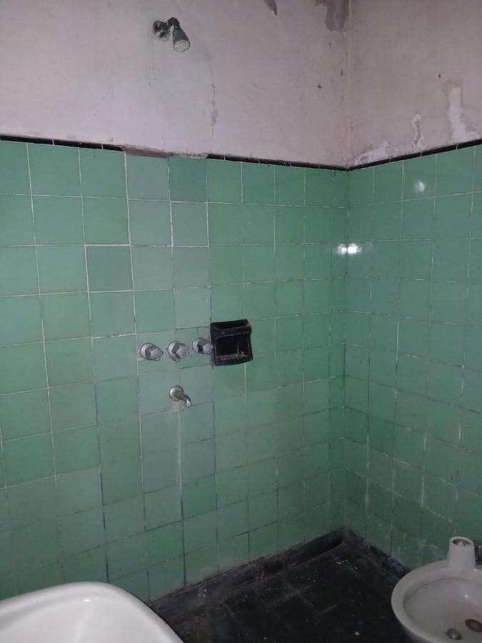 House in Need of Renovation with Large Lot
