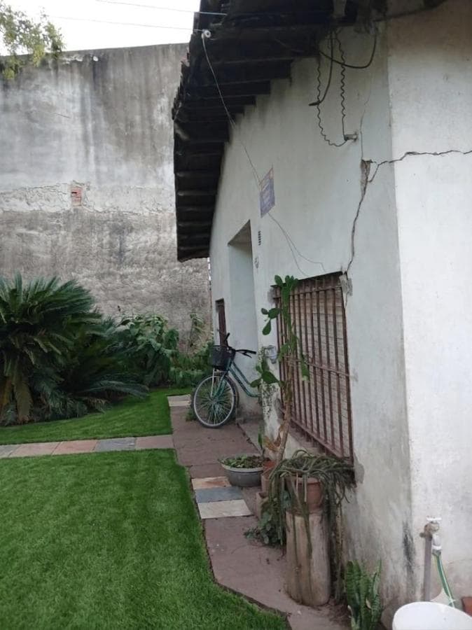 House in Need of Renovation with Large Lot
