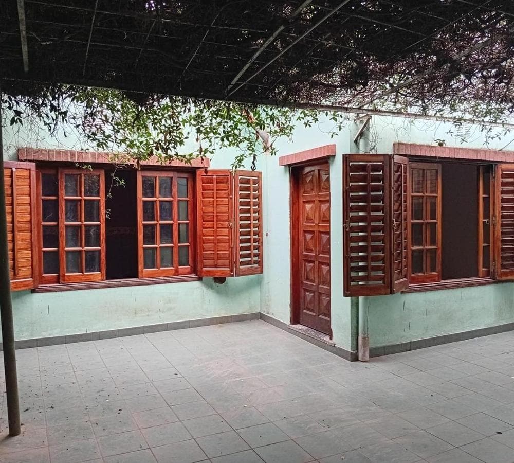 Multifamily home with 2 four-room houses on a large lot