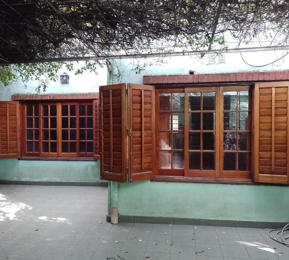 Multifamily home with 2 four-room houses on a large lot