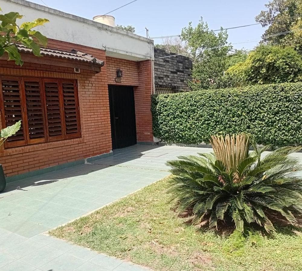 Multifamily home with 2 four-room houses on a large lot