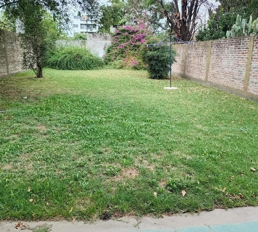 Multifamily home with 2 four-room houses on a large lot