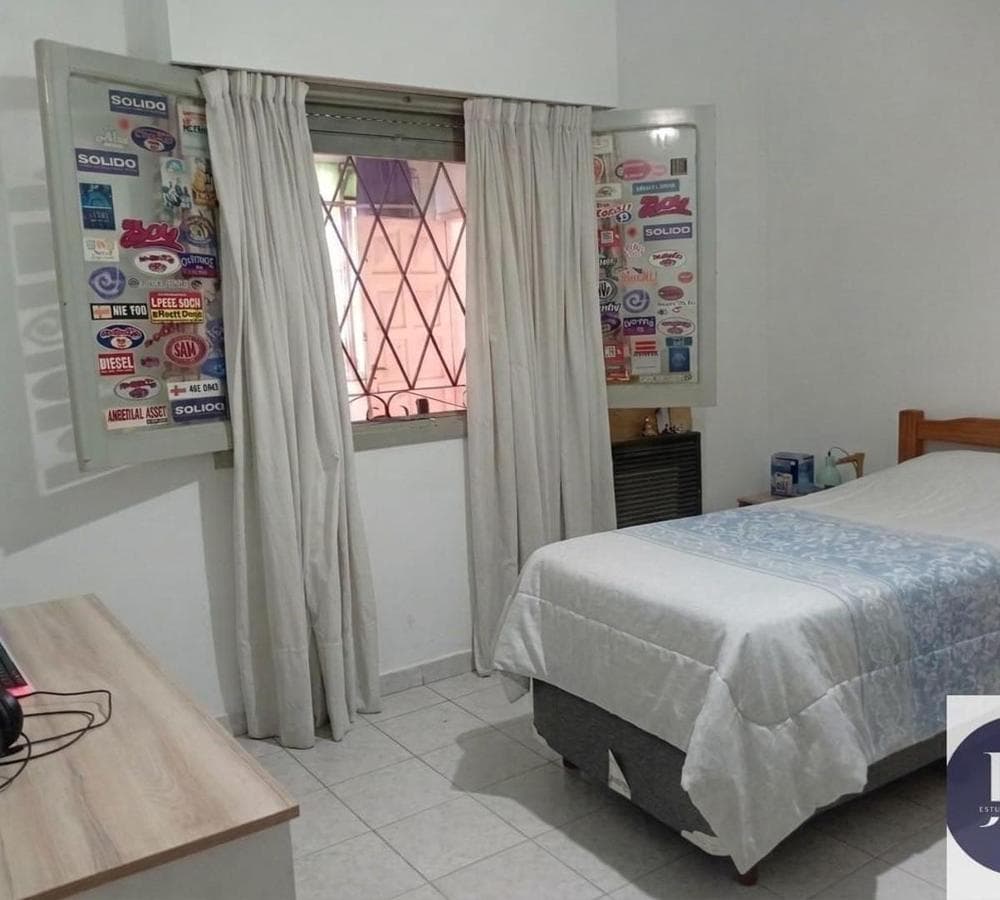 Multifamily home with 2 four-room houses on a large lot