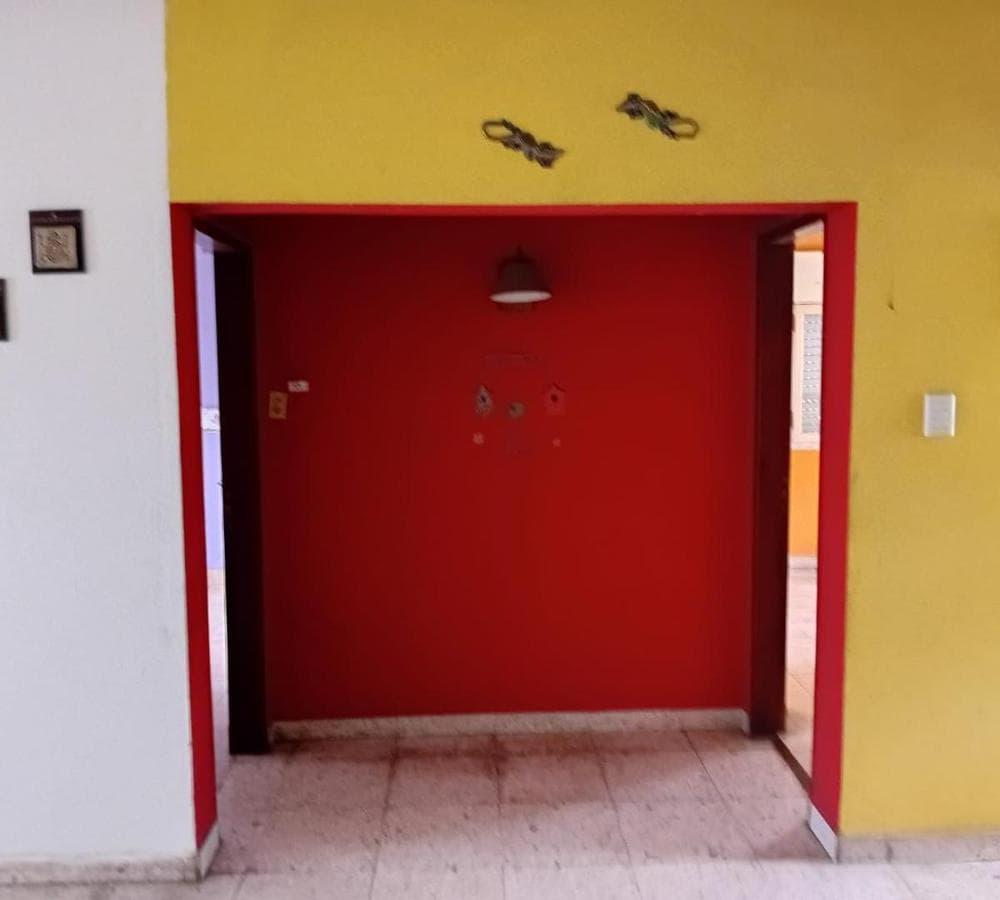 Multifamily home with 2 four-room houses on a large lot