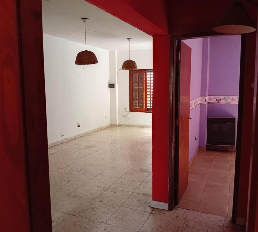 Multifamily home with 2 four-room houses on a large lot