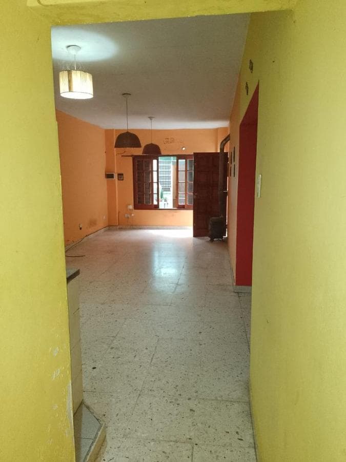 Multifamily home with 2 four-room houses on a large lot