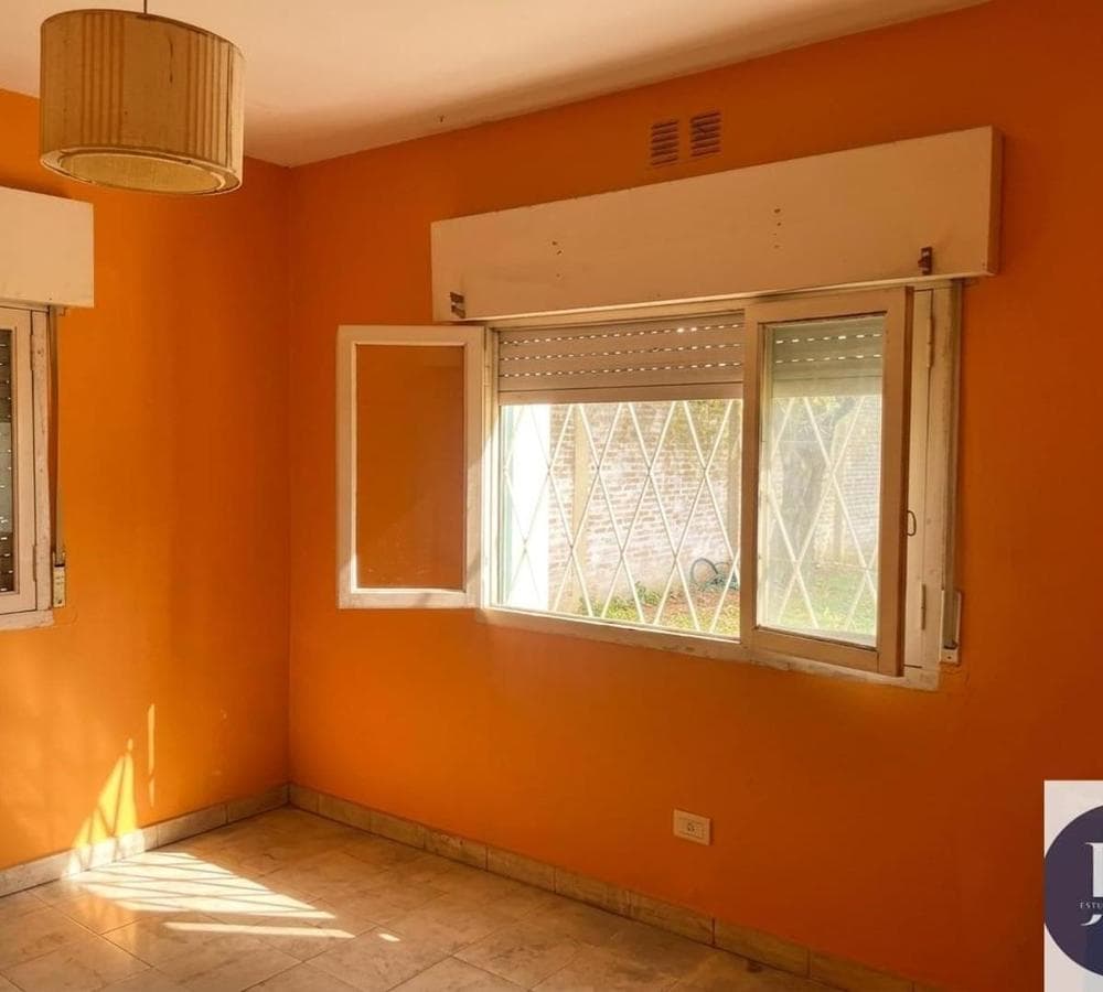 Multifamily home with 2 four-room houses on a large lot