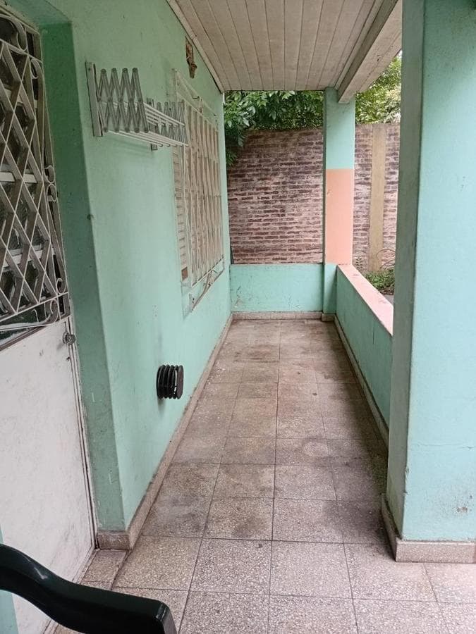 Multifamily home with 2 four-room houses on a large lot