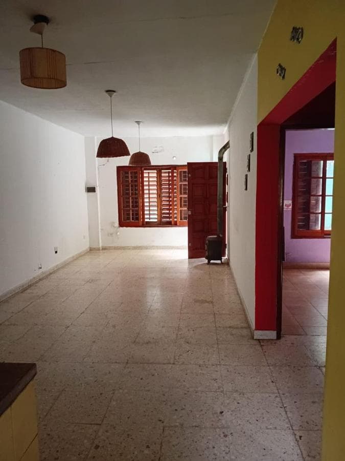 Multifamily home with 2 four-room houses on a large lot