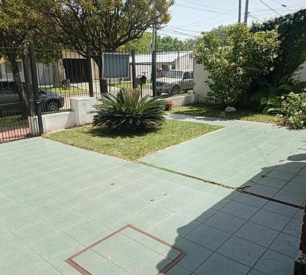 Multifamily home with 2 four-room houses on a large lot