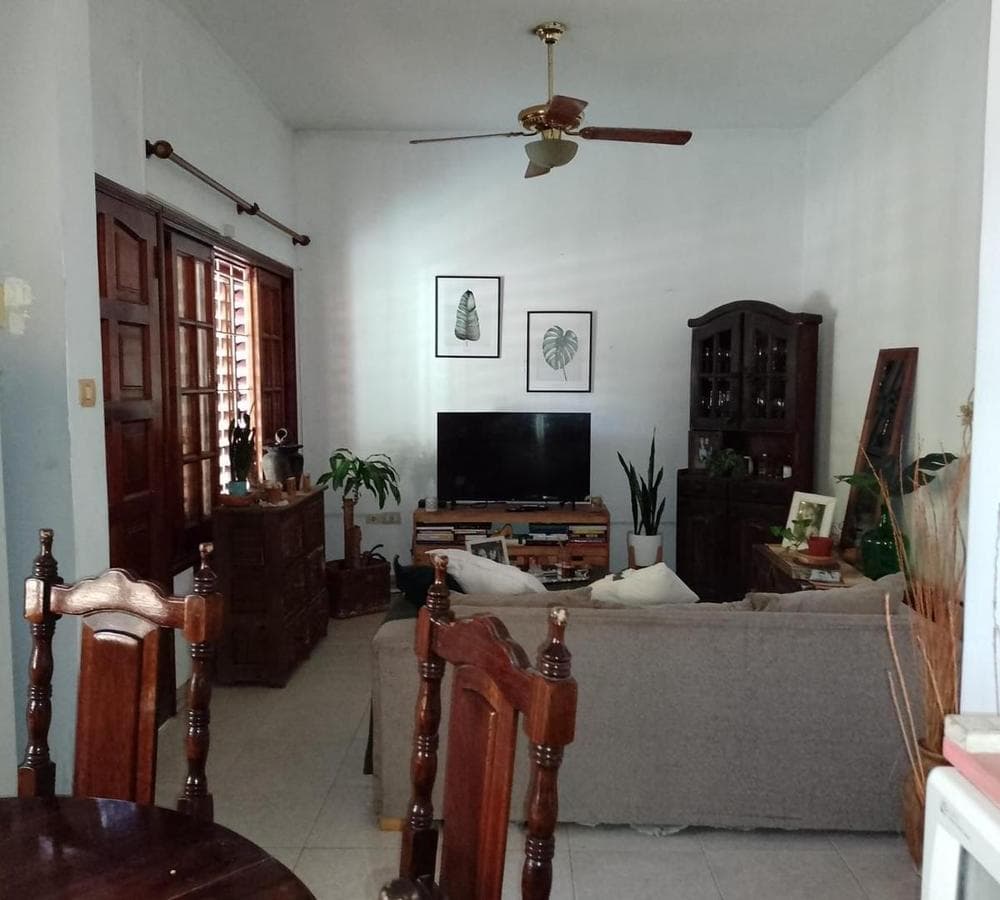 Multifamily home with 2 four-room houses on a large lot