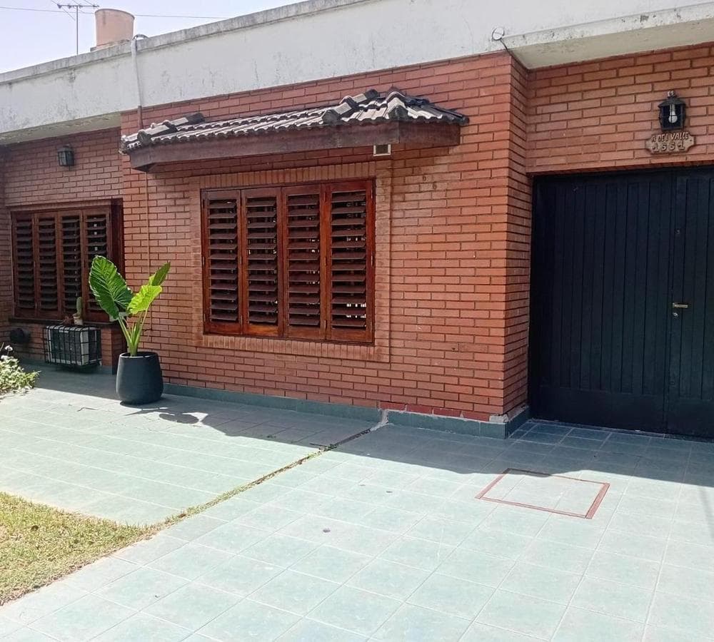 Multifamily home with 2 four-room houses on a large lot