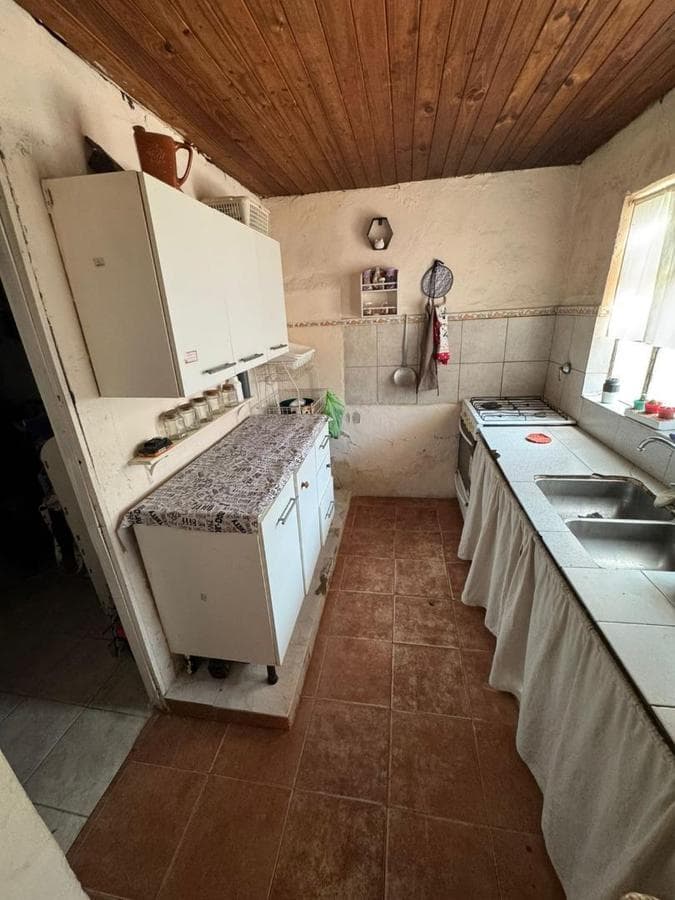 HOUSE WITH AN APARTMENT AND COMMERCIAL SPACE IN OLIVERA