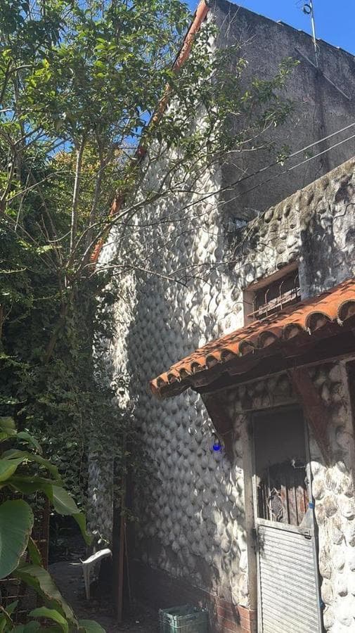 Two-story villa with multiple rooms and spacious outdoor areas